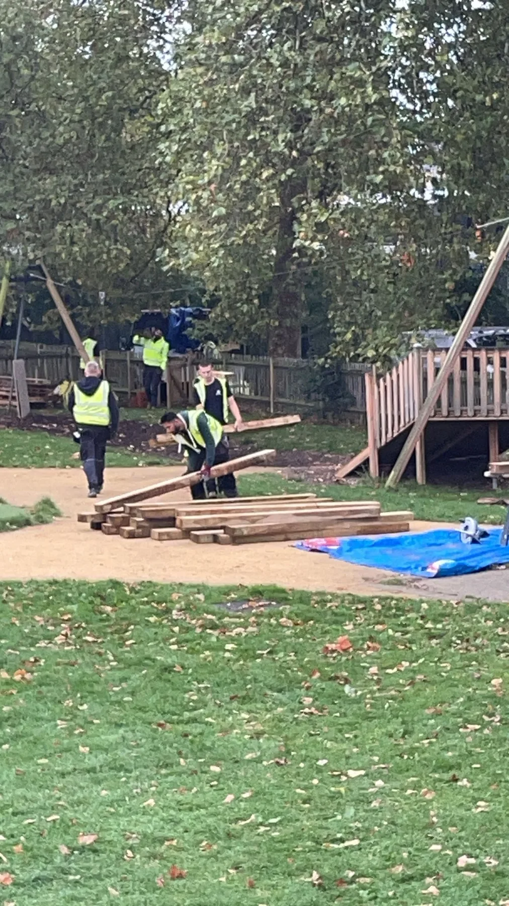 K Dean operatives moving timber during the Adventure Playground community improvement works at Hampstead Heath